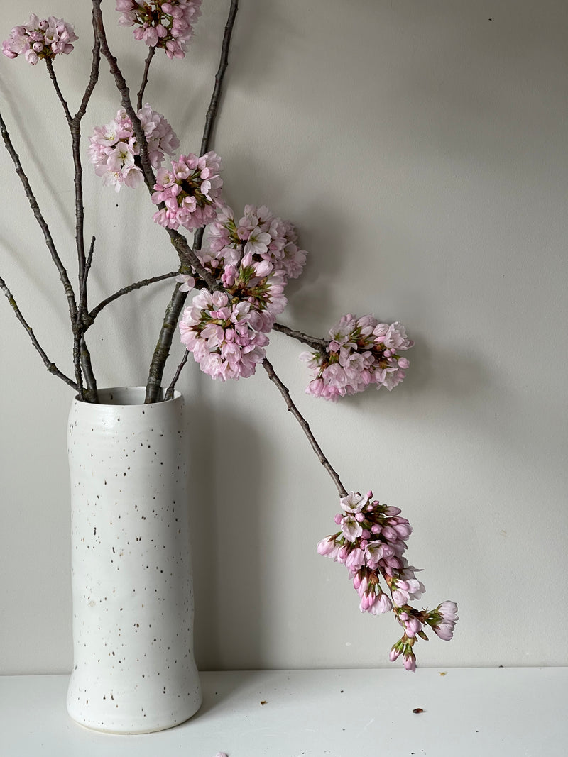 Satin white speckled vase by GOLEM no 2